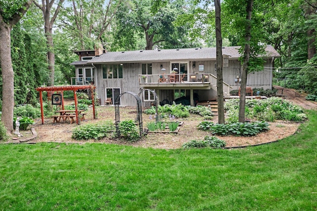 18520 29th Ave N, Plymouth, MN 55447 - rear view of house with a deck, a yard, a chimney, and roof with shingles