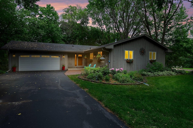 18520 29th Ave N, Plymouth, MN 55447 - ranch-style house featuring a garage, driveway, and a front yard