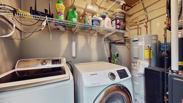2762 134th St W, Rosemount, MN 55068 - laundry room with water heater and washing machine and dryer