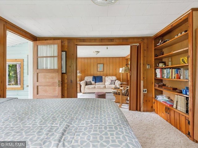 1403 County 5 NW, Hackensack, MN 56452 - bedroom with carpet floors and wood walls