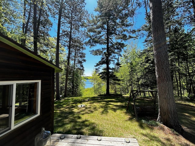 1403 County 5 NW, Hackensack, MN 56452 - view of grassy yard featuring a water view