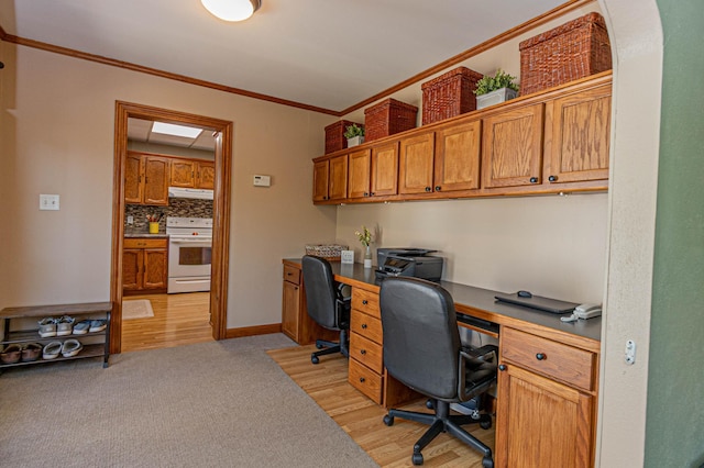114 Iowa Ave, Hoffman, MN 56339 - office featuring ornamental molding, built in desk, baseboards, light wood-style flooring, and light carpet