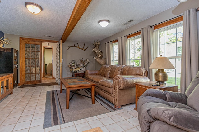 114 Iowa Ave, Hoffman, MN 56339 - living area with a textured ceiling, light tile patterned floors, healthy amount of natural light, and beam ceiling