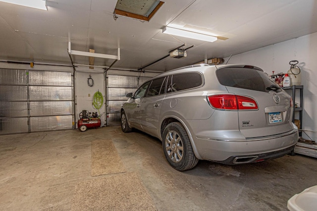 114 Iowa Ave, Hoffman, MN 56339 - garage featuring a garage door opener