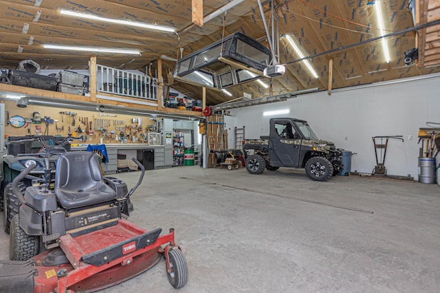 114 Iowa Ave, Hoffman, MN 56339 - garage with a garage door opener and a workshop area