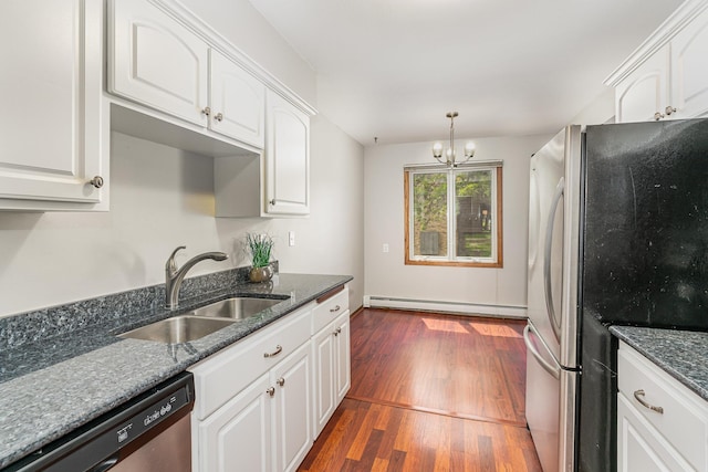 6415 York Ave S Unit 105, Edina, MN 55435 - kitchen featuring appliances with stainless steel finishes, a sink, a baseboard radiator, white cabinets, and dark wood finished floors
