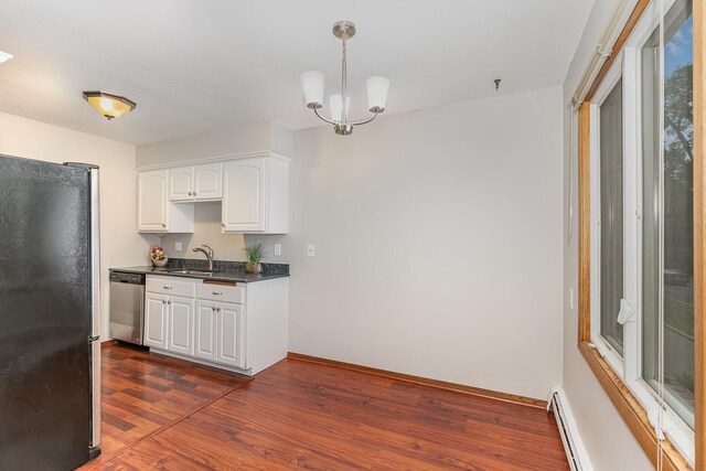 6415 York Ave S Unit 105, Edina, MN 55435 - kitchen featuring stainless steel appliances, dark countertops, a sink, and dark wood-type flooring