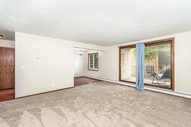 6415 York Ave S Unit 105, Edina, MN 55435 - empty room with carpet floors, a chandelier, and baseboards