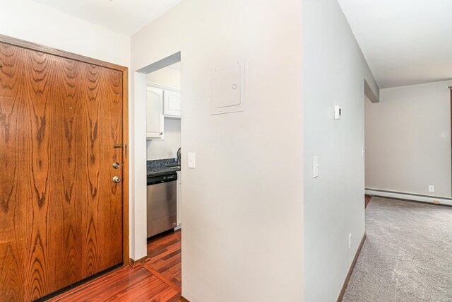 6415 York Ave S Unit 105, Edina, MN 55435 - hall featuring a baseboard heating unit and baseboards