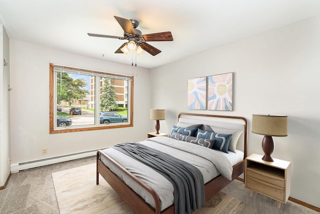 6415 York Ave S Unit 105, Edina, MN 55435 - bedroom featuring baseboard heating, carpet floors, baseboards, and ceiling fan