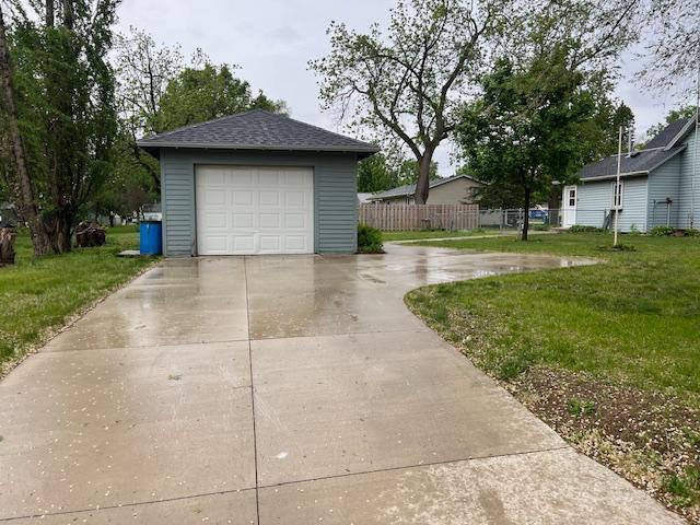 323 Weisel St, Litchfield, MN 55355 - detached garage featuring driveway
