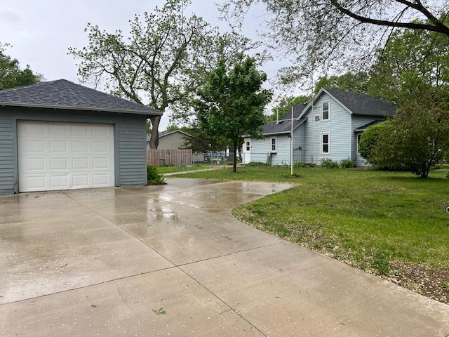 323 Weisel St, Litchfield, MN 55355 - detached garage featuring driveway