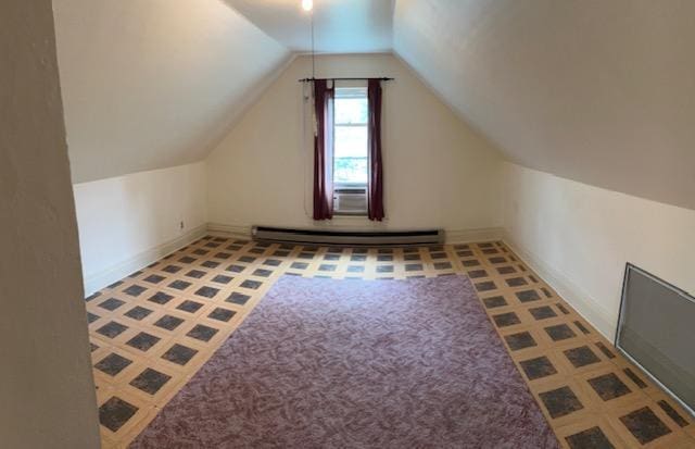323 Weisel St, Litchfield, MN 55355 - bonus room with vaulted ceiling, baseboards, and baseboard heating