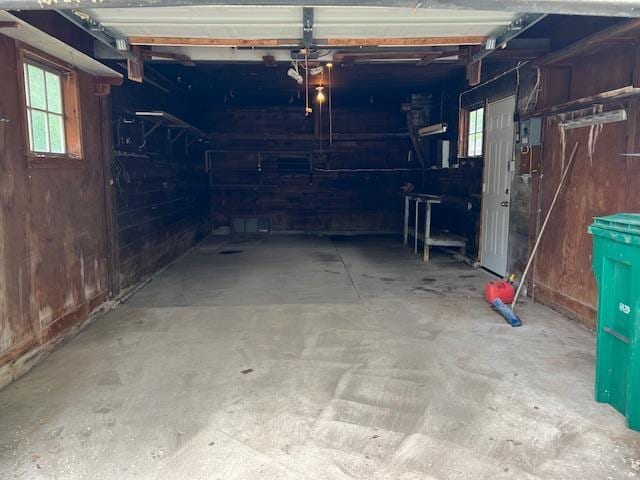 323 Weisel St, Litchfield, MN 55355 - garage featuring wooden walls