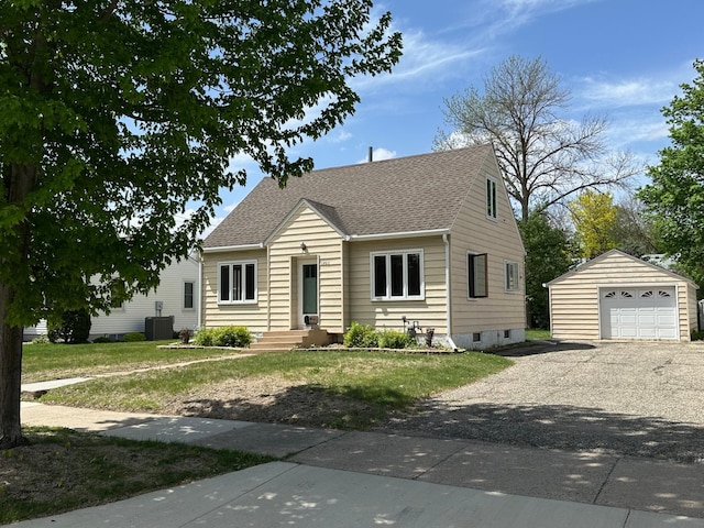 view of front facade featuring an outbuilding, central AC, roof with shingles, driveway, and a front lawn