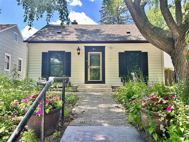 40 Penn Ave S, Minneapolis, MN 55405 - bungalow-style home with a chimney and a shingled roof
