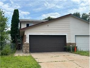 10989 Osage St NW, Coon Rapids, MN 55433 - view of side of home