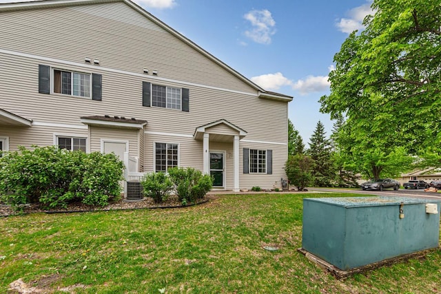 13037 Europa Trail Way N Unit A, Hugo, MN 55038 - rear view of house with central air condition unit and a yard