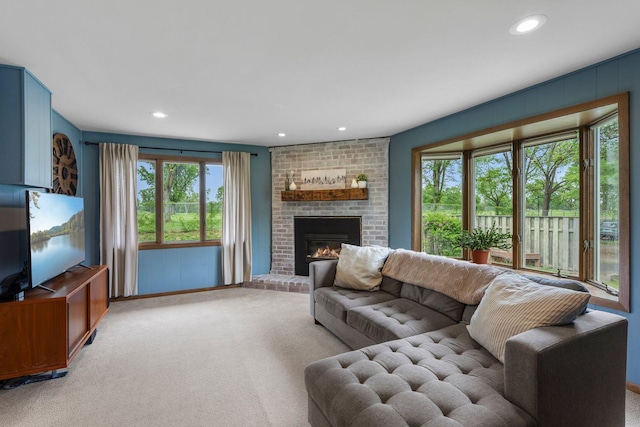 2401 Decatur Ave S, Saint Louis Park, MN 55426 - carpeted living area with plenty of natural light, recessed lighting, and a fireplace