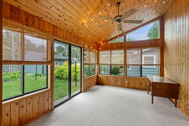2401 Decatur Ave S, Saint Louis Park, MN 55426 - unfurnished sunroom with wooden walls, plenty of natural light, carpet flooring, vaulted ceiling, and wooden ceiling