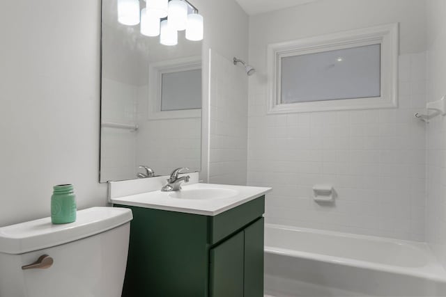 2401 Decatur Ave S, Saint Louis Park, MN 55426 - full bath featuring toilet, vanity, and washtub / shower combination