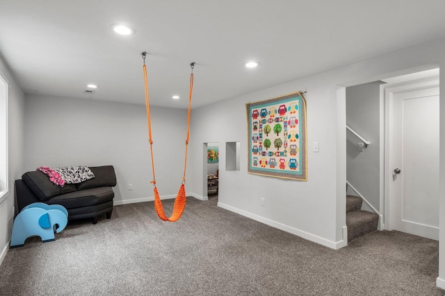 2401 Decatur Ave S, Saint Louis Park, MN 55426 - sitting room with carpet flooring, recessed lighting, stairway, and baseboards