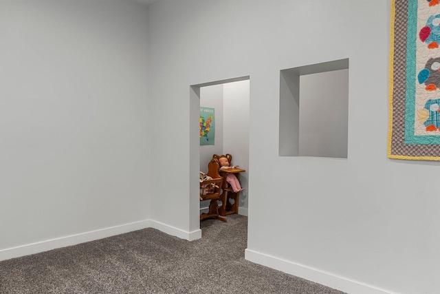 2401 Decatur Ave S, Saint Louis Park, MN 55426 - spare room featuring dark carpet and baseboards