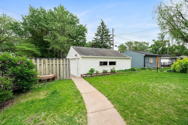 2401 Decatur Ave S, Saint Louis Park, MN 55426 - view of yard featuring an outbuilding and a garage