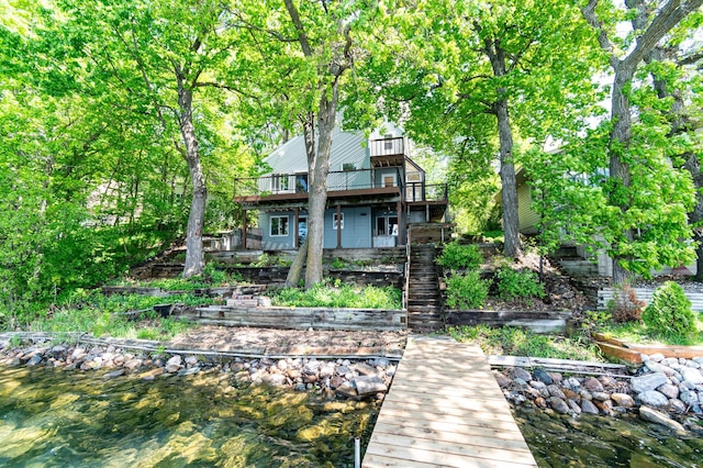 13144 Maple Circle Dr SE, Hudson Twp, MN 56334 - back of property with a deck with water view and stairs