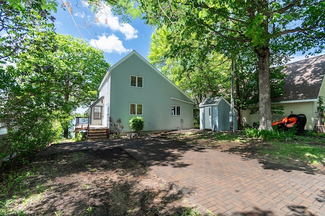 13144 Maple Circle Dr SE, Hudson Twp, MN 56334 - view of rear view of house