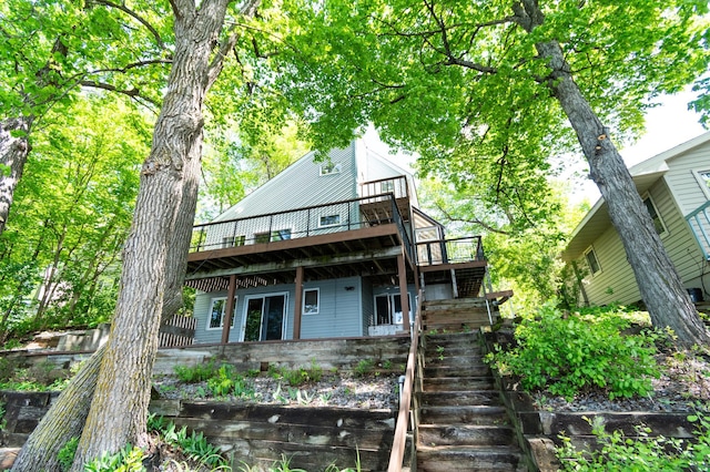 13144 Maple Circle Dr SE, Hudson Twp, MN 56334 - back of house featuring stairs and a wooden deck