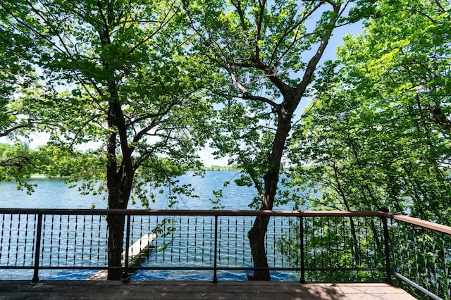 13144 Maple Circle Dr SE, Hudson Twp, MN 56334 - wooden deck with a water view
