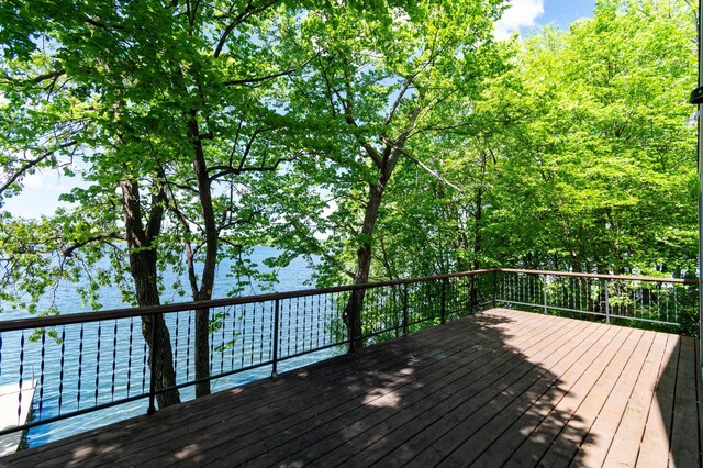 13144 Maple Circle Dr SE, Hudson Twp, MN 56334 - wooden deck with a water view