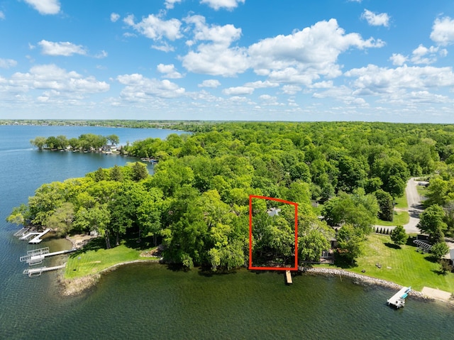 13144 Maple Circle Dr SE, Hudson Twp, MN 56334 - aerial view of property's location with a large body of water, a heavily wooded area, and property boundaries highlighted