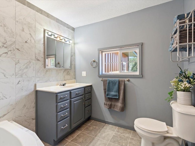 1465 State 84 NW, Backus, MN 56435 - bathroom featuring plenty of natural light, toilet, a textured ceiling, tile walls, and tile patterned floors