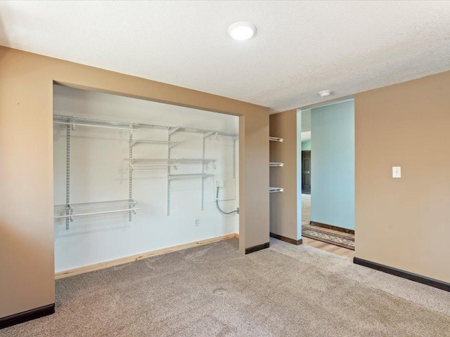 1465 State 84 NW, Backus, MN 56435 - unfurnished bedroom with carpet floors, a closet, and baseboards