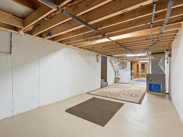 1465 State 84 NW, Backus, MN 56435 - unfinished basement featuring washer / dryer, heating unit, and stairway