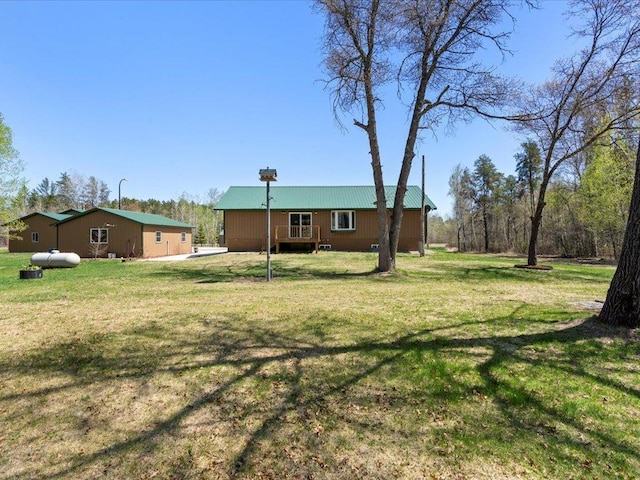 1465 State 84 NW, Backus, MN 56435 - view of grassy yard with a deck