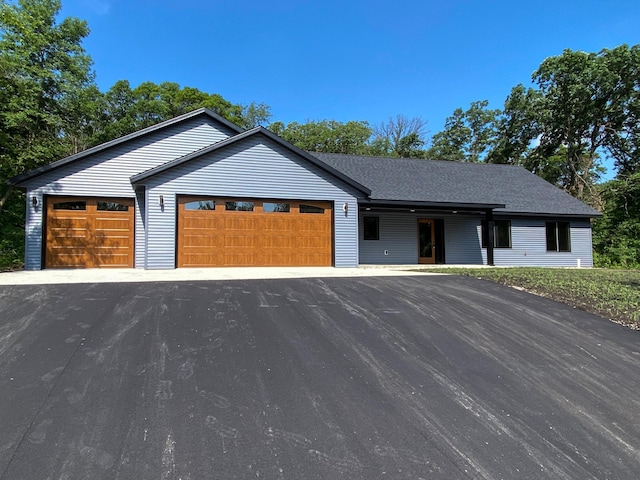 2948 N Oaks Ln NW, Garfield, MN 56332 - view of front of house with a garage and driveway
