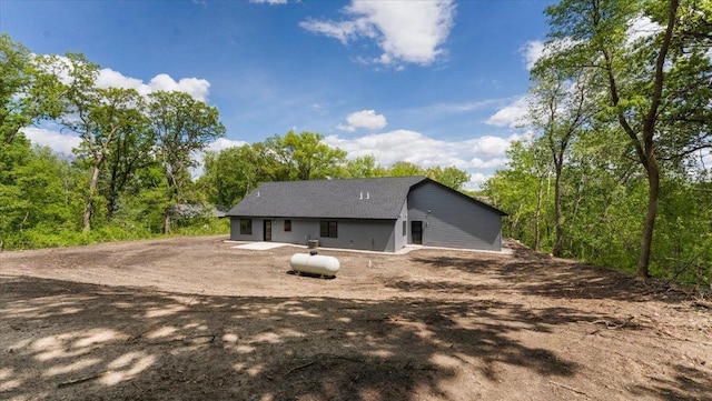 2948 N Oaks Ln NW, Garfield, MN 56332 - back of house featuring a shingled roof