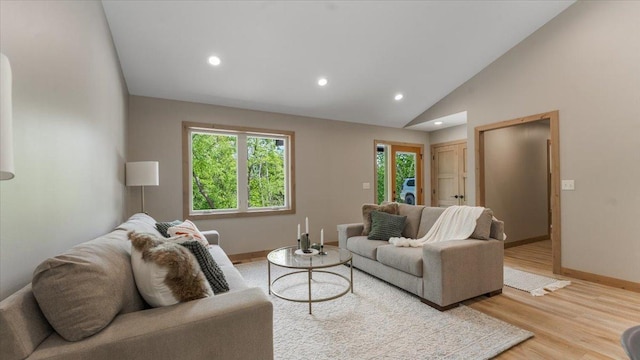 2948 N Oaks Ln NW, Garfield, MN 56332 - living area with recessed lighting, healthy amount of natural light, baseboards, wood finished floors, and high vaulted ceiling