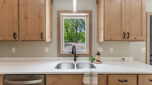 2948 N Oaks Ln NW, Garfield, MN 56332 - kitchen with a sink, dishwasher, light countertops, and light brown cabinetry