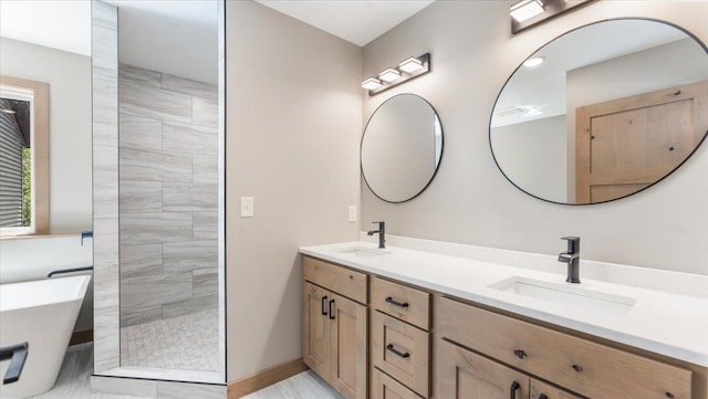 2948 N Oaks Ln NW, Garfield, MN 56332 - bathroom featuring double vanity, a soaking tub, tiled shower, and baseboards