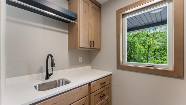 2948 N Oaks Ln NW, Garfield, MN 56332 - kitchen with a sink and light countertops