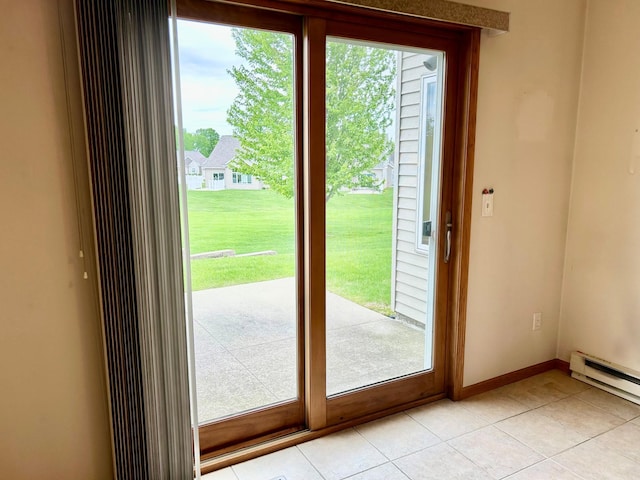 doorway with a baseboard heating unit, light tile patterned floors, and baseboards