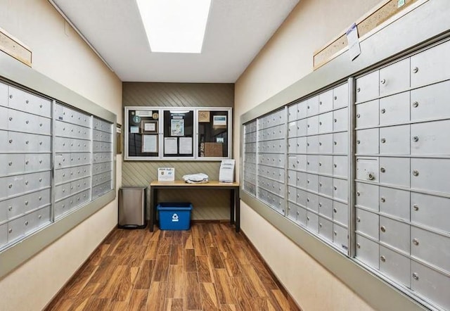 view of home's community featuring mail area