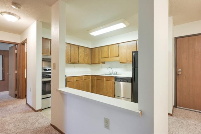 221 Grand Ave W Unit 314, South Saint Paul, MN 55075 - kitchen with stainless steel dishwasher, range, light carpet, and a sink