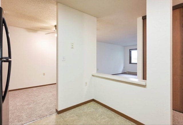 221 Grand Ave W Unit 314, South Saint Paul, MN 55075 - unfurnished room featuring a ceiling fan, light colored carpet, and baseboards