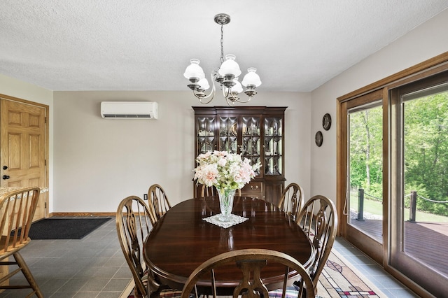 11946 180th St, Milaca Twp, MN 56353 - dining space with a chandelier, a wall mounted air conditioner, tile patterned flooring, and a textured ceiling