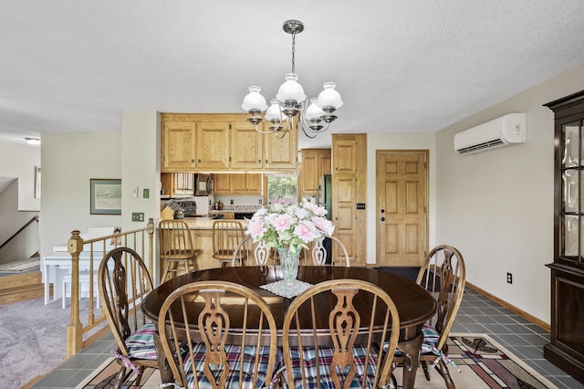 11946 180th St, Milaca Twp, MN 56353 - dining space with an AC wall unit, a chandelier, a textured ceiling, and baseboards